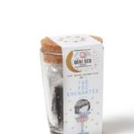 qs_the_fee_encgantee_tasse_1-150x150 THE FEE ENCHANTEE (thé noir aromatisé violette-vanille, suc'déco étoiles) EN INFUSETTES  
